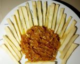 A picture of step 3 of Fried yam with carrot sauce.