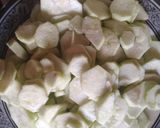 A picture of step 2 of Turai ki sabzi. (Ridge gourd).