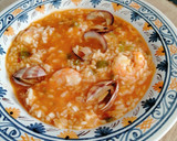 Foto del paso 12 de la receta: Arroz caldoso con langostinos y almejas
