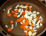 A picture of step 1 of Chicken Noodle Soup with Carrot, Onion, and Hard-Boiled Egg.