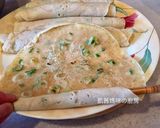 A picture of step 7 of Scallion Egg Pancake Rolls.