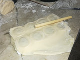 Sorrentinos rellenos de espinaca y jamón y queso con carusso