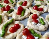 A picture of step 5 of Feta tomatoes pastry in the oven in 10 minutes.