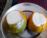 A picture of step 3 of Orange wedges icecream.