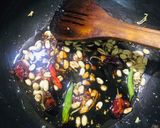 A picture of step 7 of Kung pao chicken with egg fried rice.