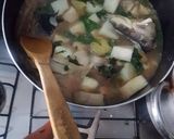A picture of step 4 of Catfish orange pepper soup and yam.