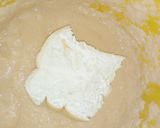 A picture of step 5 of Bread coated with akara paste.