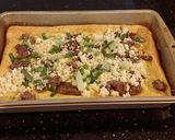 A picture of step 5 of Steak and Cheese Rolled Baked Omlet.