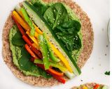 A picture of step 4 of Spinach Hummus Wrap.