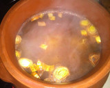 Foto del paso 2 de la receta: Cocido de garbanzos con berza, oreja y patas de cerdo