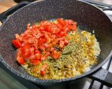 A picture of step 9 of Eggplant Curry with Mushrooms, Tomatoes, and Coconut Milk.