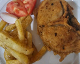 Foto del paso 3 de la receta: Merluza rebozada con patatas