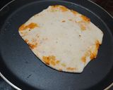 A picture of step 7 of Cheesy pizza sauce paratha.