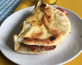 A picture of step 3 of Dishoom Bacon Naan Rolls.