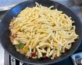 Une image de l'étape 12 de Gratin de macaronis au lard, courgettes et roquefort.
