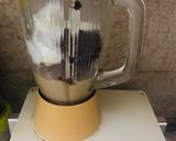 A picture of step 3 of Leftovers brownie/ chocolate cake shake.