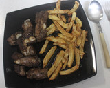 Foto del paso 11 de la receta: Costillar adobado con patatas fritas