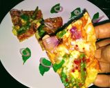 A picture of step 4 of Roti pizza(leftover chapati).