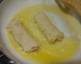 A picture of step 12 of Peanut Butter French Toast Roll-Ups With Banana & Almond Filling.