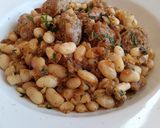Foto del paso 7 de la receta Alubias con butifarra con salsa de parmesano y albahaca