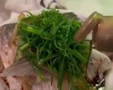A picture of step 11 of Steamed Grass carp with assorted vegetables in Cantonese style.