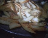 A picture of step 2 of Chilli potatoes flax and sesame seeds rice.