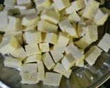 A picture of step 1 of Sunheri paneer.