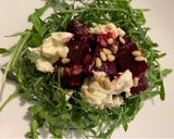 A picture of step 4 of Beet, Arugula, and Goat Cheese Salad.