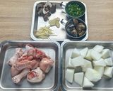 A picture of step 2 of Clam, Winter Melon, and Chicken Soup.