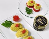 A picture of step 6 of Deviled Eggs with Manchego Cheese Spread and Avocado.