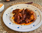 Foto del paso 10 de la receta: Alitas de pollo en salsa de tomate