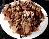 A picture of step 2 of My Roast pork, Balsamic glaze on Crusty Cob with salad & chips.