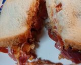 A picture of step 2 of Leftover Pizza Topping Sandwich.