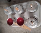 A picture of step 4 of Red Fruity Juicy Popsicles.