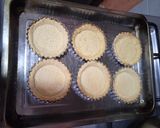 Foto del paso 3 de la receta: Tarteletas de crema pastelera, dulce de leche, almendras, coco y chocolate