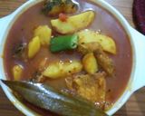 A picture of step 4 of Potato Rahu Fish Curry.