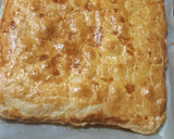 Foto del paso 9 de la receta: Hojaldrada con verduras con queso y gambones