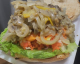Foto del paso 8 de la receta: Sándwich con muchos vegetales y pollo🥙🥯🧅🍆🍗🥪