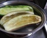 Foto del paso 4 de la receta: Berenjena y calabacín relleno de carne molida