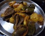 A picture of step 4 of Stir fry Baingan aloo.