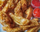 Foto langkah ke 5 dari resep Fried Potato Wedges.