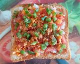 A picture of step 4 of Bread Pizza Without Fire.