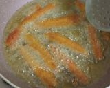 A picture of step 2 of Baby Corn fingers with cheesy dip.