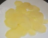 Foto del paso 3 de la receta Patatas al horno con nata, mozzarella, jamón York y huevo