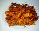A picture of step 6 of Jollof rice, coleslaw and peppered chicken.