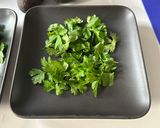 A picture of step 3 of Avocado Salad with Capers and Herbs.