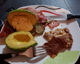 A picture of step 8 of Avocado Stuffed and Wrapped with Smoked Bacon.