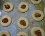 Foto del paso 4 de la receta: Ojitos o pepas de dulce de leche