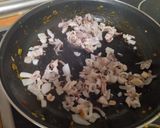 Foto del paso 3 de la receta: Pimientos rellenos de calamares, arroz y jamón serrano