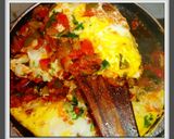 A picture of step 11 of Shukshuka in Indian style.